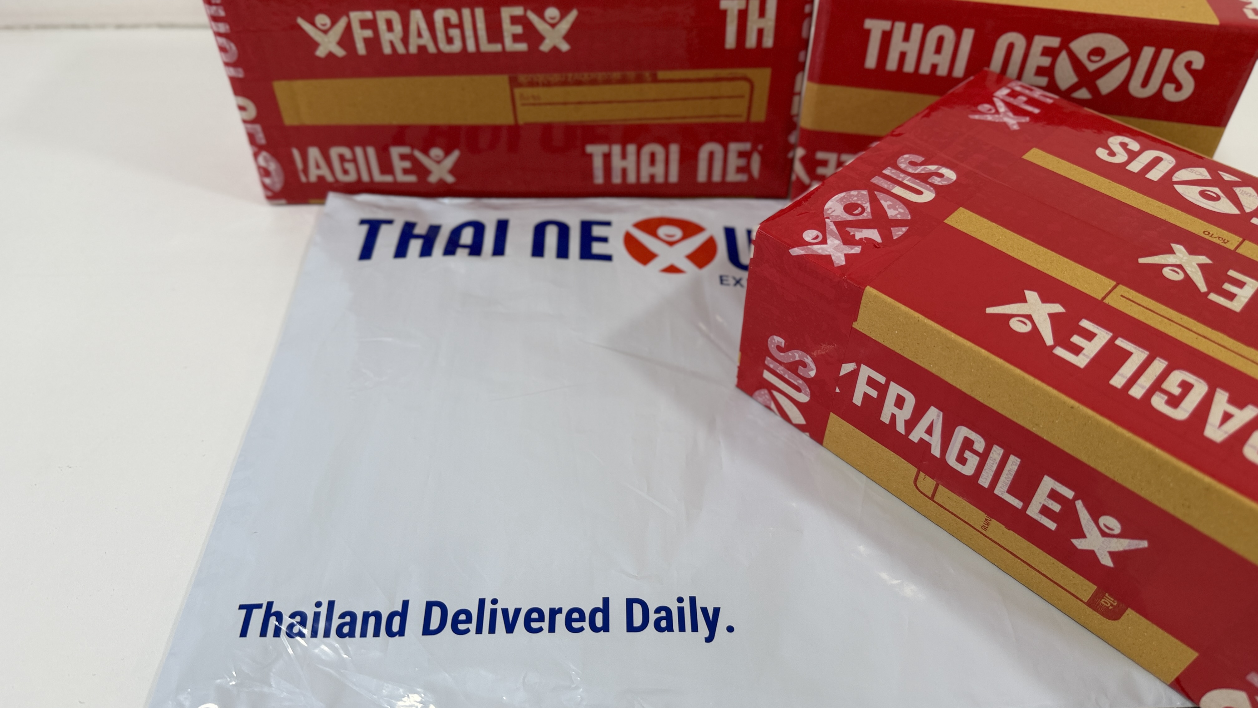 Fragile export boxes and poly mailers prepared at Thai Nexus