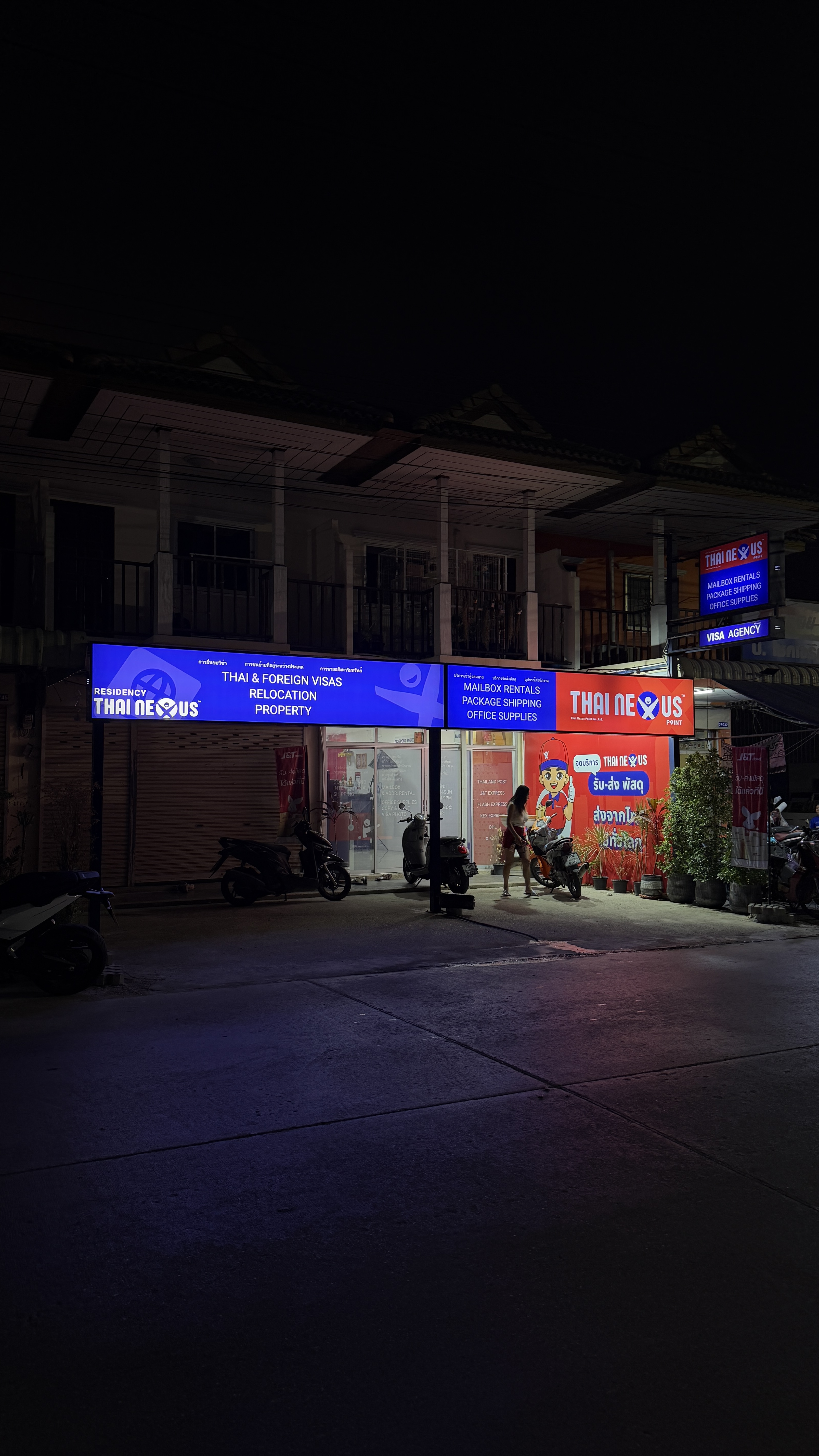 Thai Nexus Point shopfront at night in Nong Kae, Hua Hin