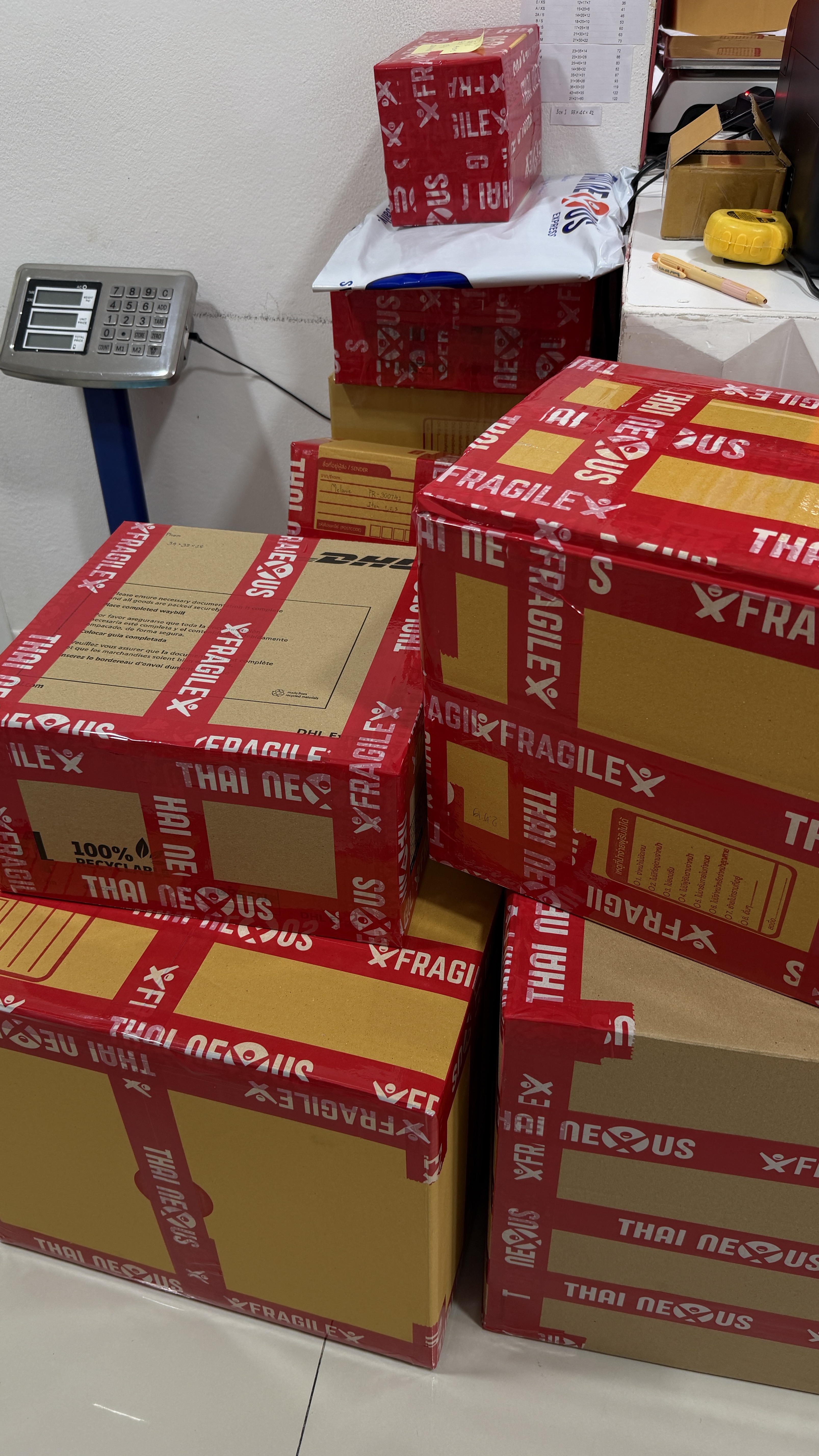 Packed international parcels ready for export at Thai Nexus