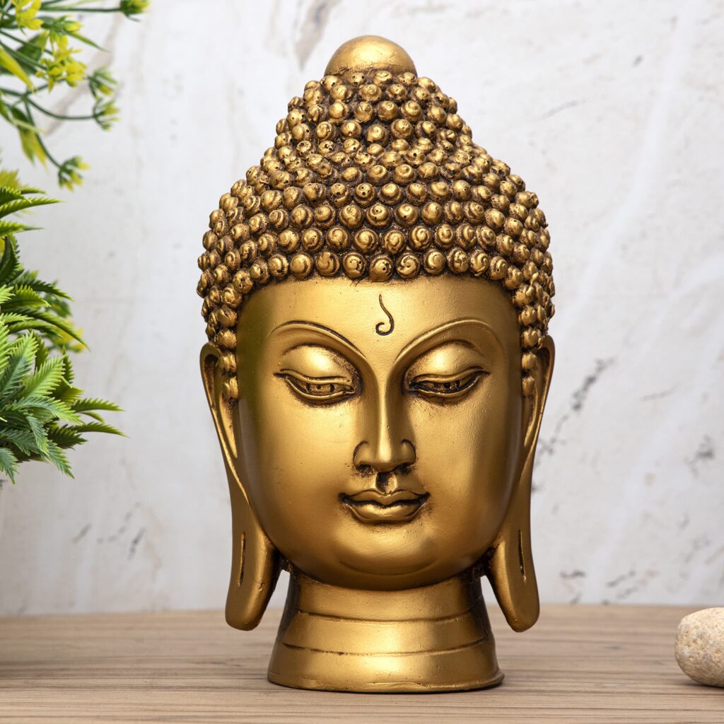 Buddha Head sitting on table