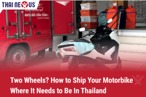 A Motorbike beside a truck in Pattaya ready to be loaded and shipped to Hua Hin